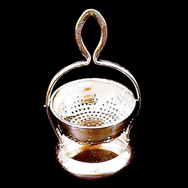 Antique Silver tea strainer and attached stand holder